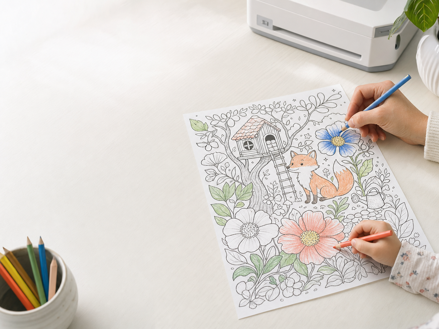 A parent and child coloring a detailed ColorKind page together
